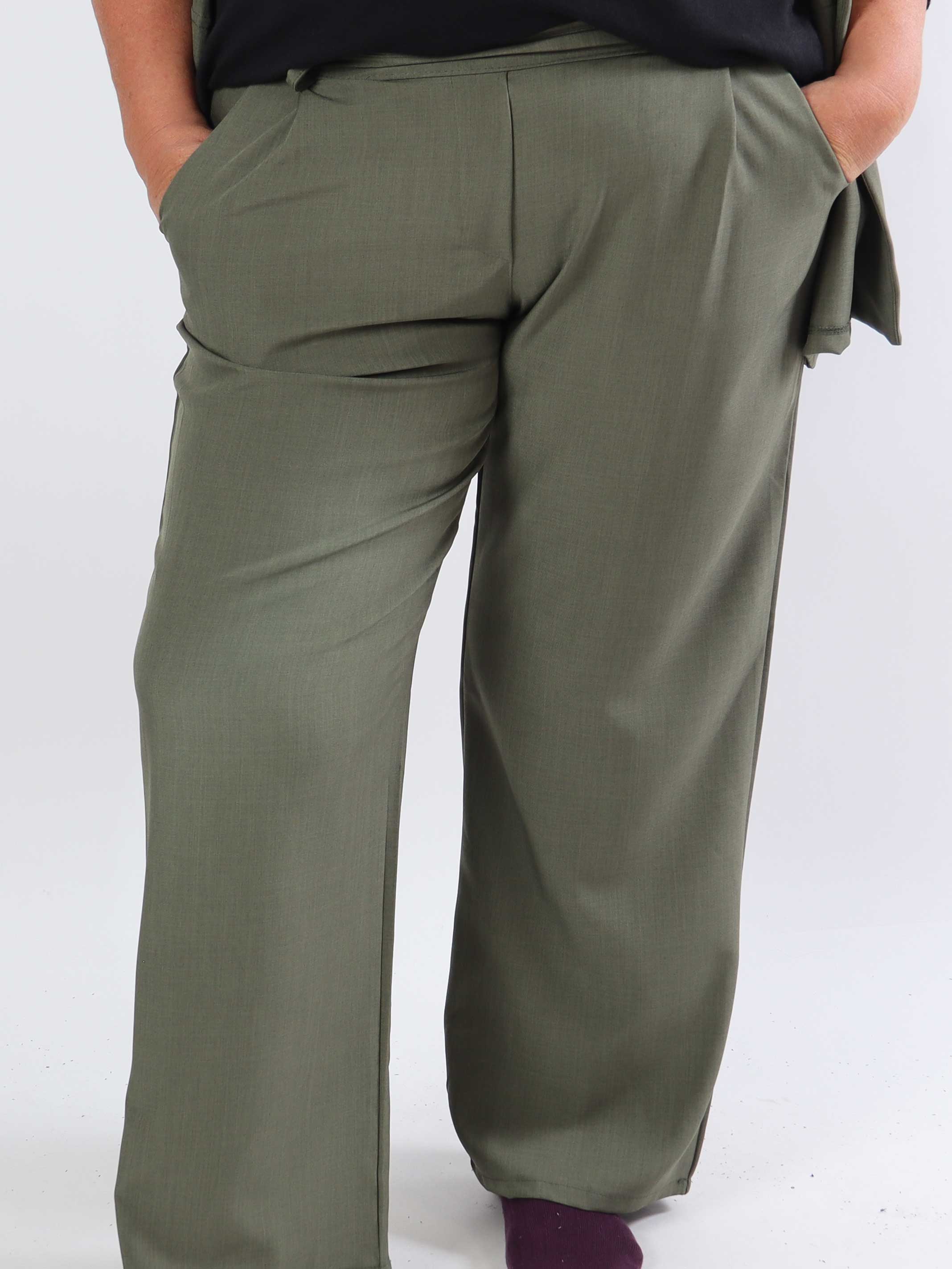 Shadia Pants - Enfärgade kostymbyxor med resår i ryggen